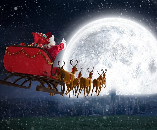 Santa Claus flying to the Moon with presents (Image)